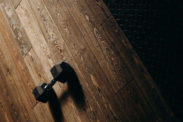 Hex dumbbell on the timber training floor at Muscle Up Sheffield
